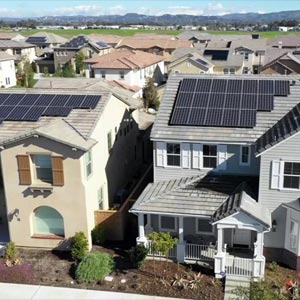 advantage-solar-panels-photo-of-houses-in-the-village-with-solar-panels-in-their-roofs